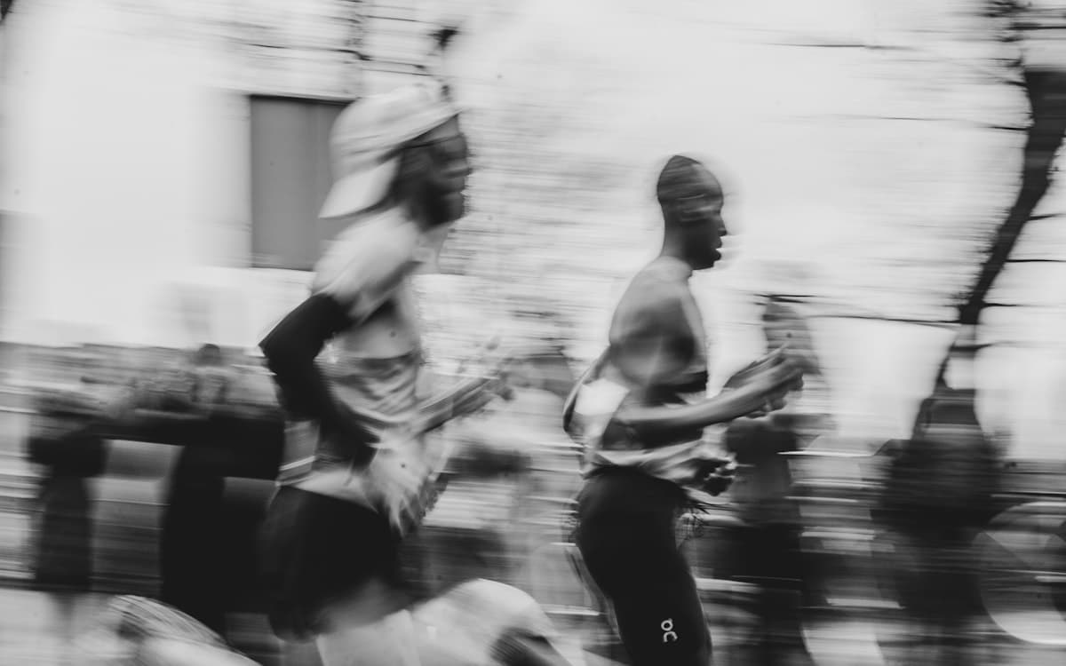 Race photographer shooting runners on course