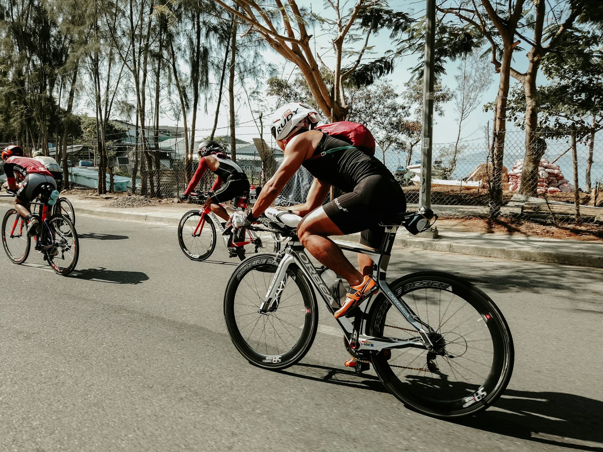 Cyclists on the road during the bike leg of a triathlon